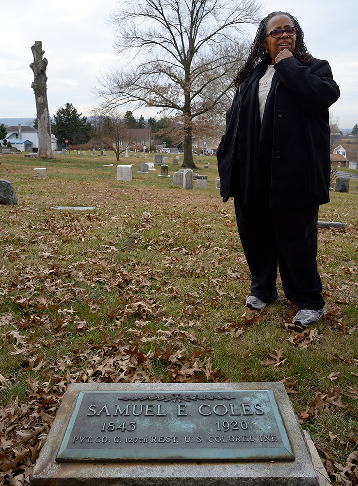 Barbara Barksdale in Midland Cemetery at the grave of Civil War private Samuel E. Coles.