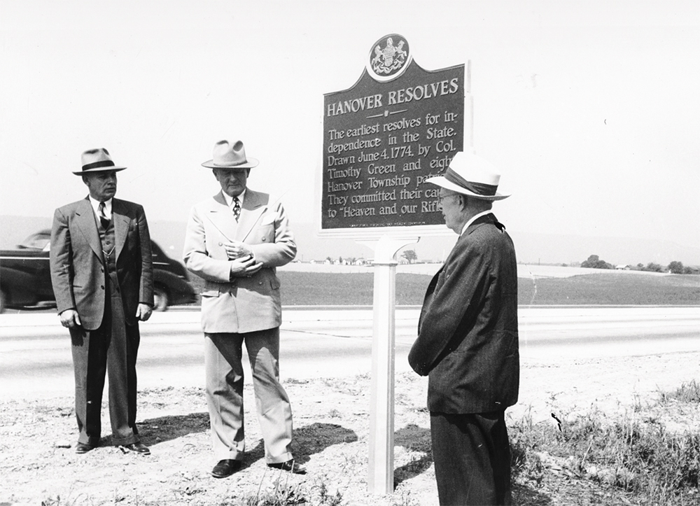 The first marker in the style used today, Hanover Resolves, was dedicated in September 1946 by PHMC chairman James H. Duff (center), commissioner Charles G. Webb (left) and marker committee chair Thomas Murphy (right). RG-13/PA State Archives