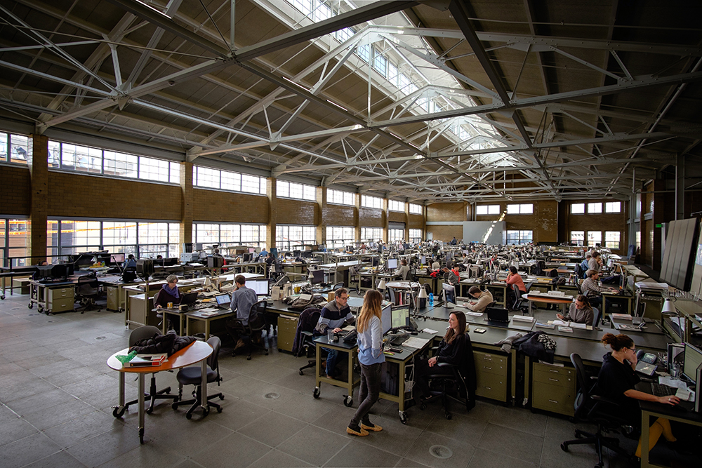 The upper level of the Bottling House today, now the home of architecture firm KieranTimberlake. The clerestory windows and skylights are once again operable for efficient ventilation and natural light.