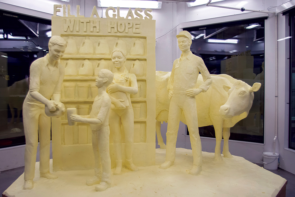 Butter sculpture has been a Farm Show tradition for 25 years. Jim Victor made his first one in 1995, and his wife, Marie Pelton, joined him in 2000. They are both graduates of the Pennsylvania Academy of the Fine Arts in Philadelphia. For the 2015 sculpture, they started working the day after Christmas, welding together metal poles and wire mesh to create the outline of their characters before adding the nearly 1,000 pounds of butter donated by the Land O’Lakes plant in South Middleton Township, Cumberland County.