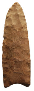 A Clovis spearpoint uncovered at the site in 1973. Photo by Michael Franks