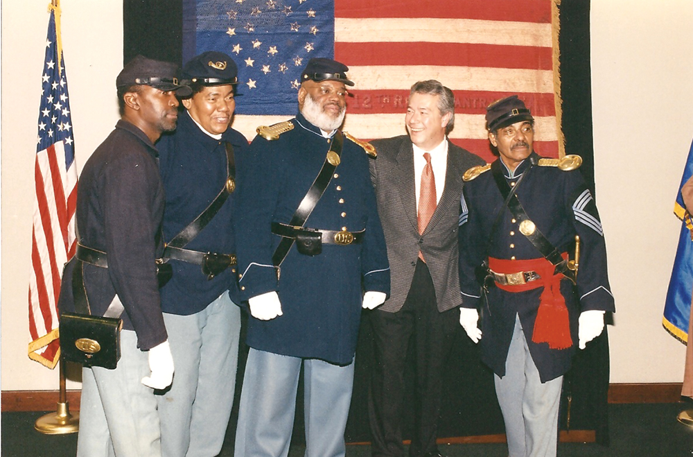 During an undercover sting at a hotel near the Philadelphia International Airport, Wittman recovered a frail battle flag of the 12th Regiment Infantry, Corps D’Afrique, one of the first units of black soldiers to fight for the Union during the American Civil War. The flag was presented to the U.S. Army’s chief of military history during a ceremony at FBI headquarters attended by FBI director Louis J. Freeh, reenactors and Wittman, second from right. Courtesy Robert K. Wittman