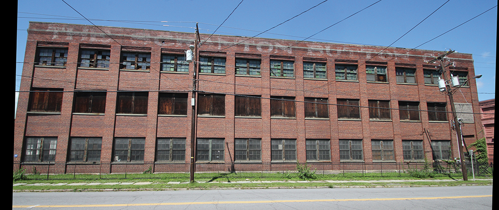 The Scranton Button Co. lettering is still visible at the top of the company’s machine shop, built in 1913. Pennsylvania State Historic Preservation Office/Photo by Robert Powers