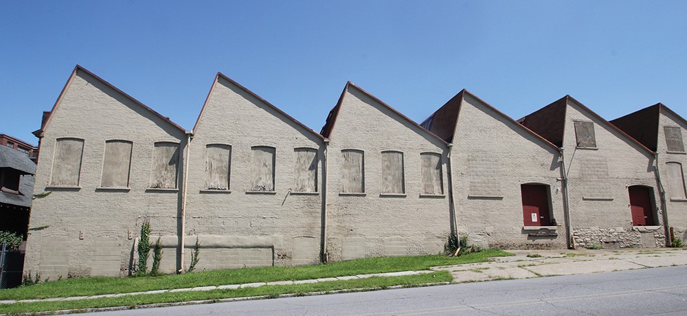 The unique saw-tooth roof pattern on this 1909 Scranton Button Co. building enabled an increase of natural light and ventilation on the factory floor. Pennsylvania State Historic Preservation Office/Photo by Robert Powers