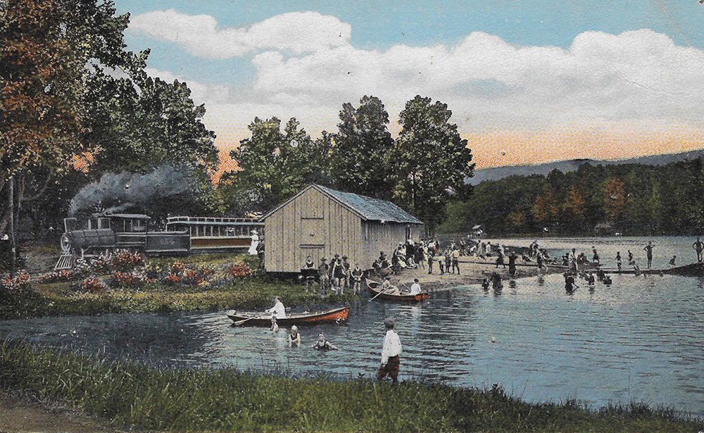 Park visitors rent canoes and swim in Lake Conewago as the narrow-gauge train passes by on its route around the lake.