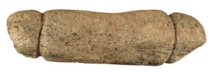 An unusual soapstone object - found in Bedford County and likely dating from 1,000 to 6,850 years ago - with an unclear function, as its shape does not conform to typical net sinkers from this period. The State Museum of Pennsylvania