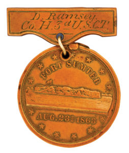 The Gillmore Medal, presented to David Ramsey of the 3rd United State Colored Troops, are both part of the collections of The State Museum of Pennsylvania.