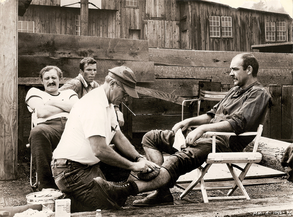 Richard Harris, far left, and Sean Connery, far right, relax on location at Eckley during the filming of The Molly Maguires. Eckley Miners' Village