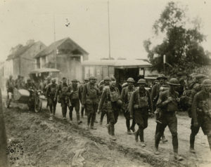 The 28th entering Bézu-Saint-Germain in France after the Germans evacuated, July 24, 1918.