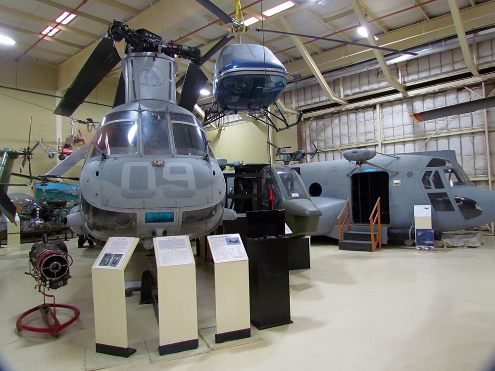 The Boeing CH-46E Sea Knight with the Enstrom F28A, Cobra Flight Simulator and Boeing HH-47 CSAR Mock-up. AHMEC/Photo by Jan Feighner