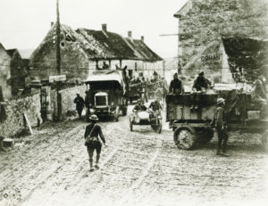A truck train of the 28th Division passing through Dravegny, France, August 5, 1918. Pennsylvania State Archives/MG-156