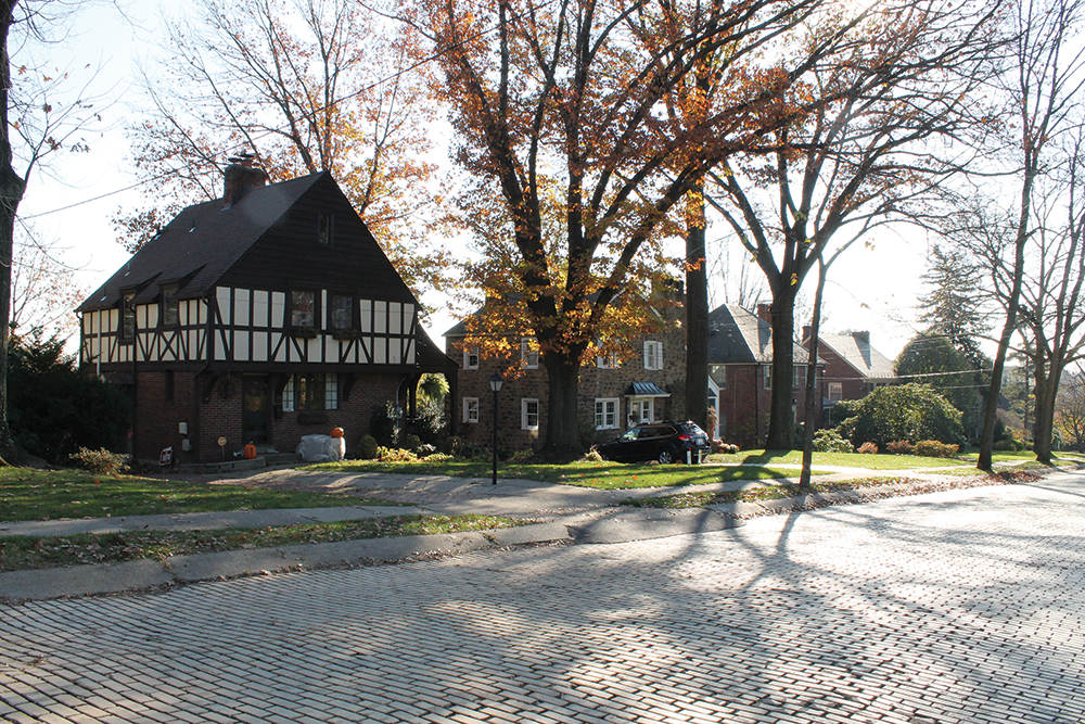 Parker Drive in Mt. Lebanon’s Parker Gardens residential subdivision features rolled curbs, brick streets, and large houses in period styles. Courtesy Skelly & Loy Inc.