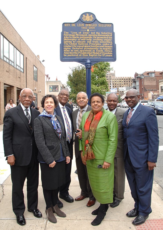 Leon Howard Sullivan marker dedication at Zion Baptist Church in Philadelphia, October 16, 2017: left to right, W. Wilson Goode, former mayor of Philadelphia; Nancy Moses, PHMC chair; William B. Moore, pastor, 10th Memorial Baptist Church; Albert W. Campbell, supply pastor, Zion Baptist Church; Mildred Fitzgerald Johnson, trustee/historical marker chair, Zion Baptist Church; Raymond Blue, associate pastor, Zion Baptist Church; and Herb Lusk, pastor, Greater Exodus Baptist Church. Pennsylvania State Historic Preservation Office