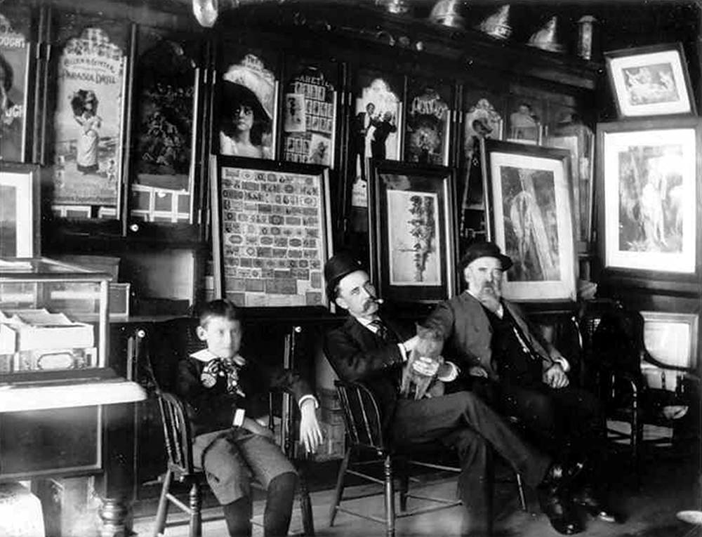 Charles Demuth, the future artist, left, in the family’s tobacco store in the early 1890s. The Demuth Museum, Lancaster, PA