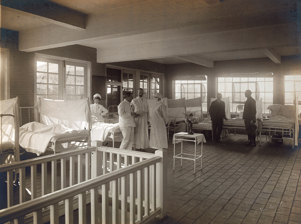 Medical personnel tend to influenza patients in this ward at Samaritan Hospital at Temple University in Philadelphia.