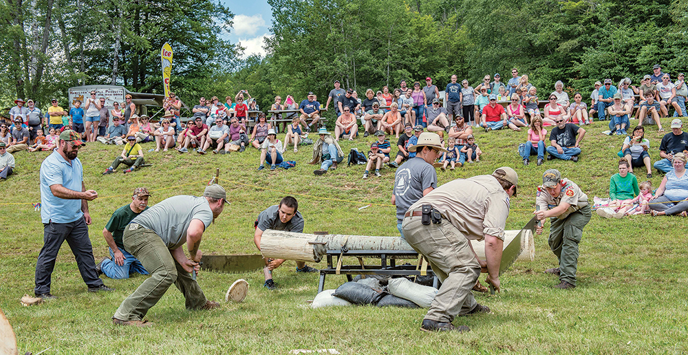 The crosscut saw competition is one of the highlights of the Bark Peelers’ Festival.