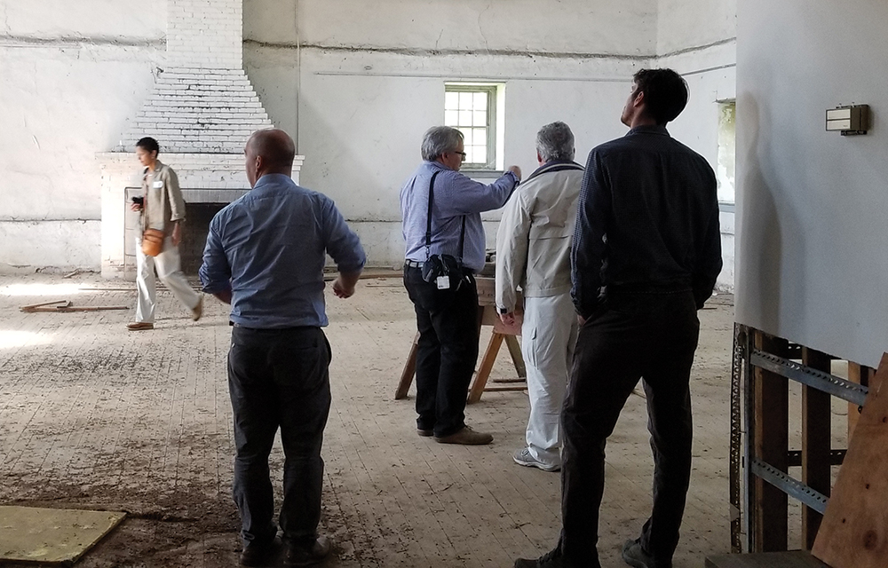 Workshop attendees inspect the interior of Mather Mill. Photo, Pennsylvania Historical & Museum Commission