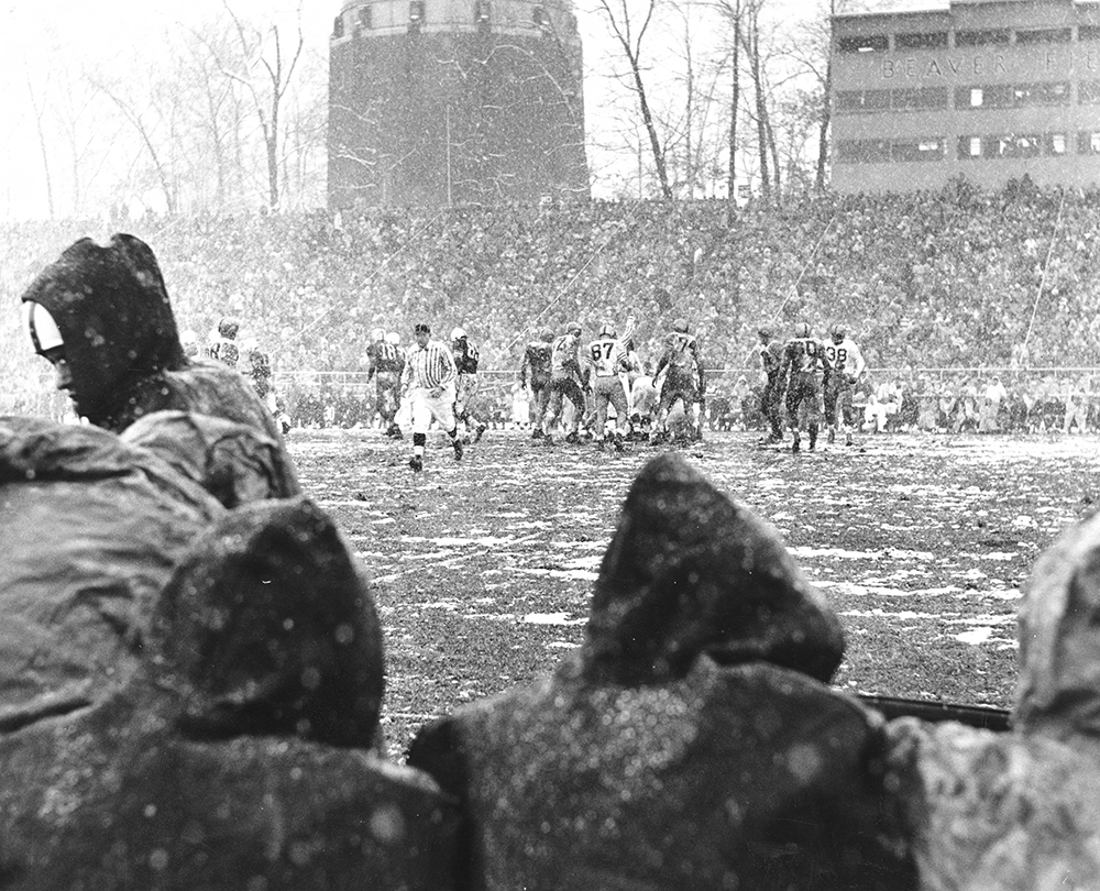 Snow falls on Beaver Field in this view from the Penn State sideline in a game against Pittsburgh on November 19, 1955.