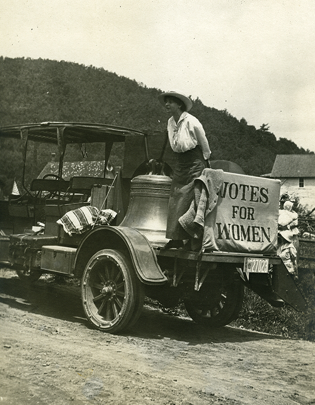 Louise Hall, organizing secretary of the Pennsylvania Woman Suffrage Association, speaks from the platform of the Justice Bell truck at one of its many stops in the hinterlands of Pennsylvania in the summer of 1915. Despite battling poor roads and mechanical breakdowns, the auto campaign helped suffragists reach voters in relatively isolated sections of the state.