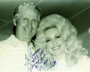Lawrence Waltman, second generation owner of Sunset Park, with Dolly Parton, who debuted her legendary song “Coat of Many Colors” there. Courtesy of the Waltman Family
