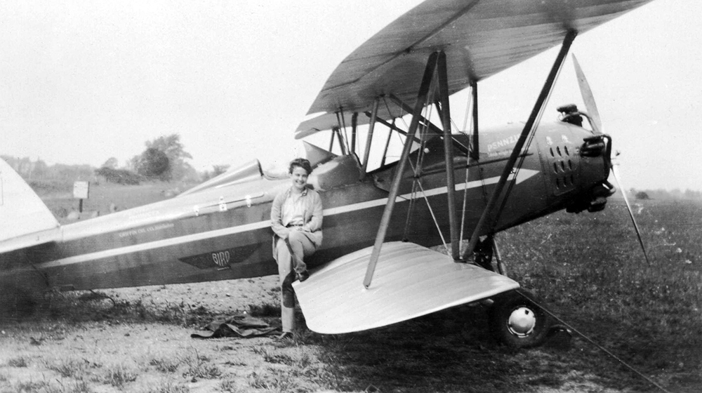 Richey with her four-seat biplane. Courtesy of the San Diego Air & Space Museum