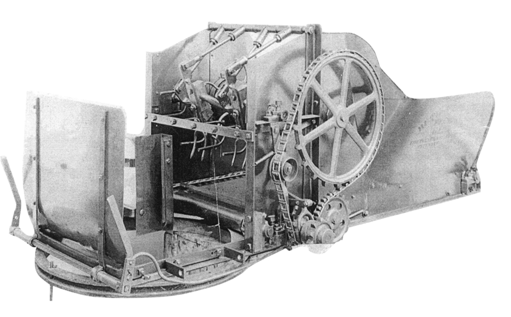 A photograph of the feeder apart from the bale press. Its most important features included a wide sheet metal receiving hopper, a chain-drive conveyor, whirling tines to loosen clumps of straw, and a turntable to adjust to conditions at each customer’s farm. Courtesy Gwendolyn Ruth Dickinson