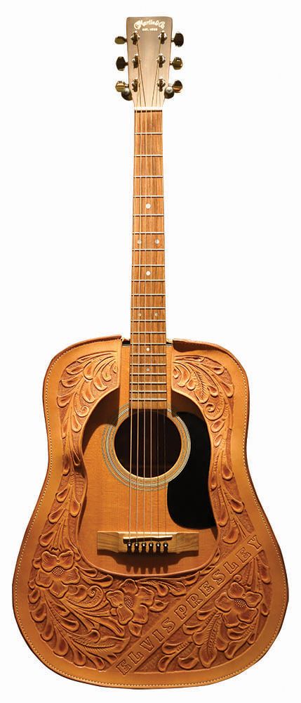Elvis Presley’s 1950s leather-covered Martin Dreadnought, used in the Sun Records recordings. Guitar, C. F. Martin & Co. Collection / Photo, PHMC