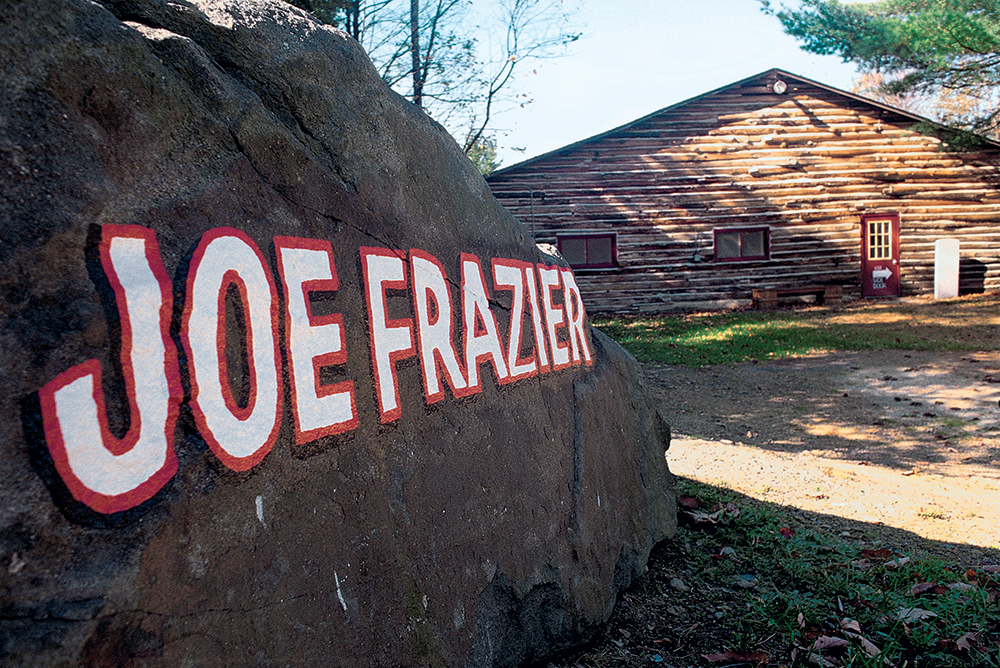 Cassius Clay Sr., Ali’s father, painted the names of fighters his son admired on the large boulders scattered around the camp. Photo, ©Jeff Julian