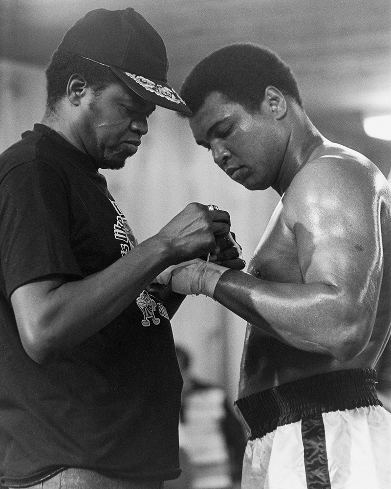 Ali at a training session with cornerman Drew “Bundini” Brown at the camp in 1978. Brown coined the phrase “float like a butterfly, sting like a bee.” Photo, ©Jeff Julian
