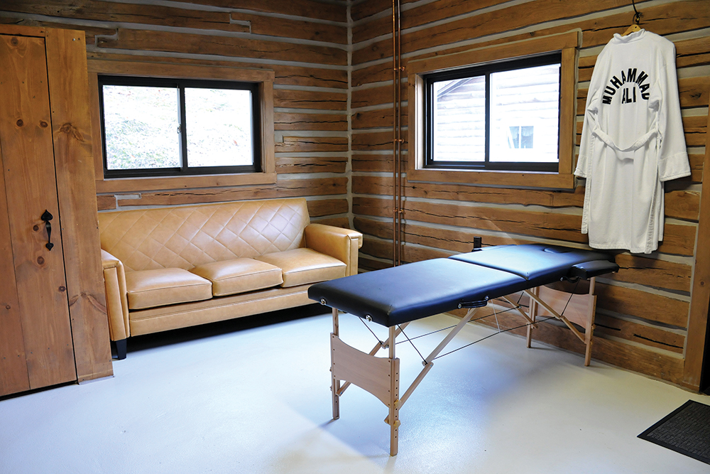 The restored dressing room in the log gym at the camp. In addition to getting massages in this space, Ali often held court with members of the press here. Photo, ©Jeff Julian