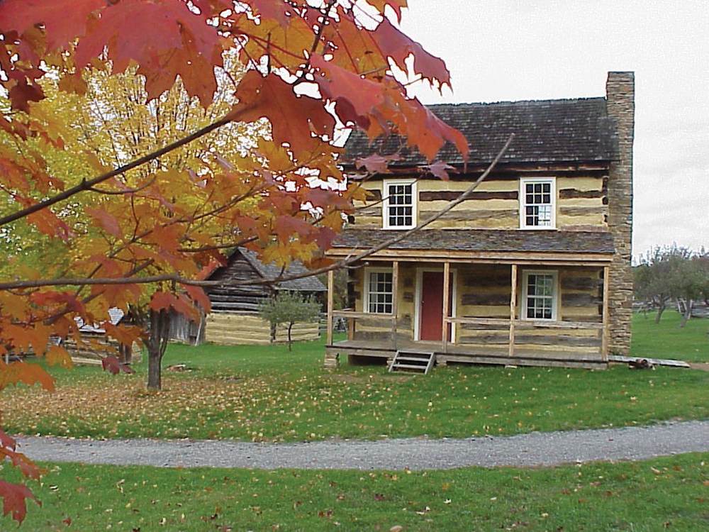 Over the course of Somerset Historical Center's 50 years, the 1830s Farmstead has developed around the Adam Miller Farmhouse (one of several original structures moved to the site) to include a detached farm kitchen and double-crib log barn. Somerset Historical Center, PHMC