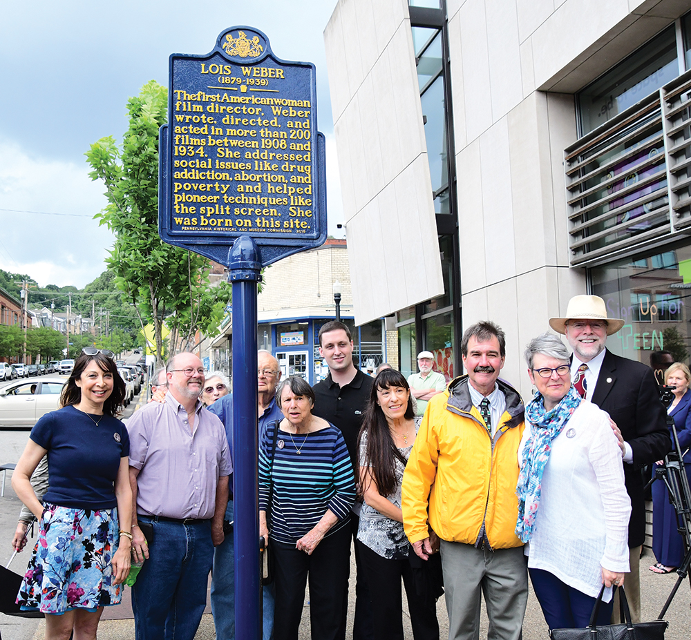 Actress Illeana Douglas, left, and film scholar Shelley Stamp, right, flank the extended family of Lois Weber at the unveiling of her historic marker in Pittsburgh, 2019. Heinz History Center