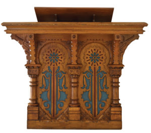 Rodeph Shalom’s monumental Furness-designed pulpit nearly replicates the building’s architecture — with carved details reminiscent of the rose windows and the squat columns — while underscoring American Jewish reformers’ introduction of English-language sermons. Pulpit, Congregation Rodeph Shalom, Philadlephia / Photo, PHMC