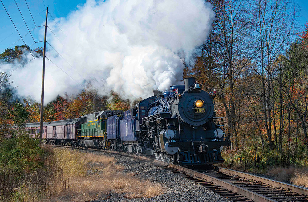 Built by Baldwin Locomotive Works in 1928, Reading & Northern 4-6-2-type engine No. 425 approaches a rural crossing east of Molino, near Port Clinton, Schuylkill County, during a fall foliage excursion on October 19, 2019. Photo, Dan Cupper