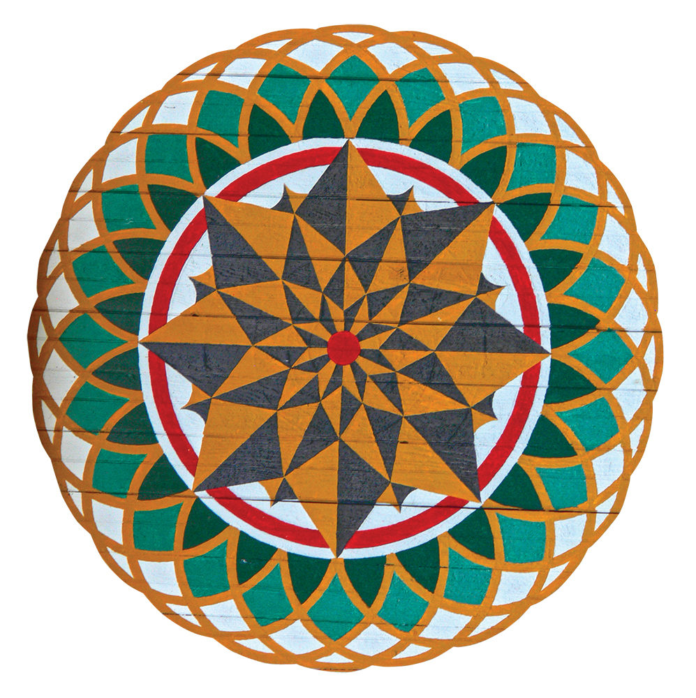 Milton Hill’s signature star pattern consisted of an eight-pointed starburst and an elaborate border of interlacing arcs. The design is executed in several variations with up to as many as 10 different colors. Photo, Patrick J. Donmoyer