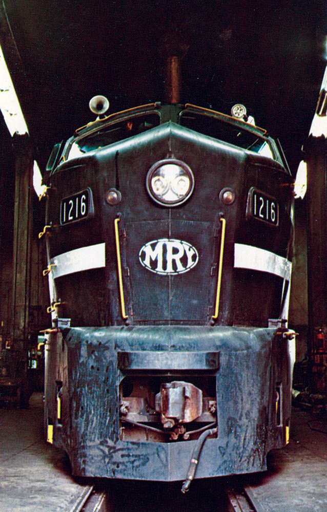 A Baldwin “sharknose” diesel, so named because of its snub-nosed cab design, peers out from the Monongahela Railway roundhouse in Brownsville, Fayette County, in September 1971. Baldwin built 232 of the streamlined sharknoses, just a fraction of the thousands of F-series units built by competitor General Motors. Photo, Dan Cupper