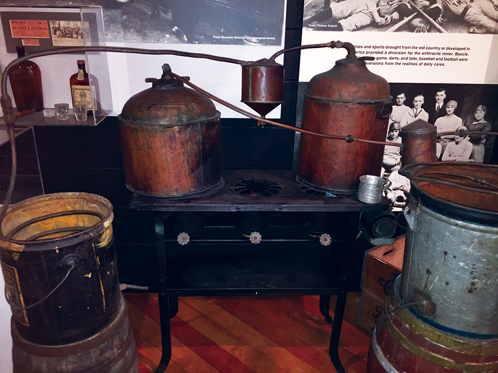 Charles Hartman built this still in the 1920s in Scranton and used it until the 1970s. It was donated to the Anthracite Heritage Museum in 1991 and later moved to Eckley Miners' Village to help interpret recreational alcohol in a typical patch town. Eckley Miners’ Village, PHMC (AC91.17)