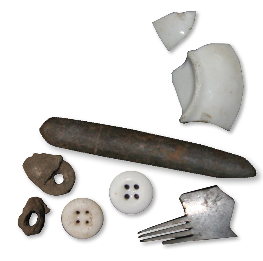 Artifacts recovered from excavations of the Robert and Lizzie Allen residence included leather eyelets, an incised lead pencil, fragments of a toy tea set, a Bakelite comb, and buttons. Photo, Angela Jaillet-Wentling