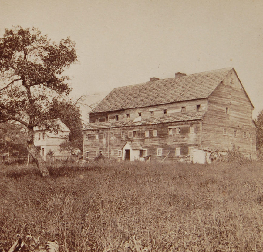 Gibbons tells the story of the Seventh Day Baptists in the essay “Ephrata.” During her research, she visited the Ephrata Cloister in 1872 and again in 1882, finding that on “the plain upon the banks of the Cocalico still stand the brother- and sister-houses.” She found “no longer do the unmarried or celibate members own all the property, but it is now vested in all who belong to the meeting, single and married, and is in the hands of trustees.” The brothers’ house, Bethania — pictured here around the time Gibbons visited the site — no longer survives. Ephrata Cloister, PHMC