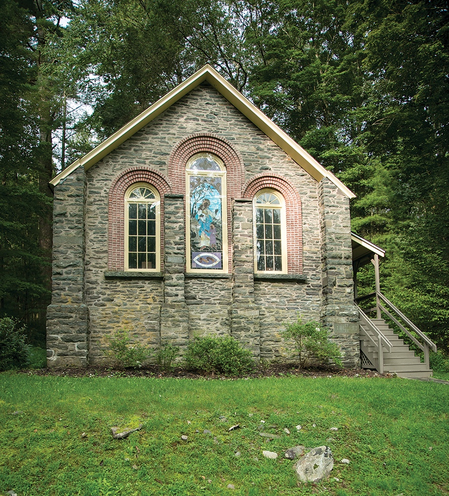 The east façade of the Parkside Chapel features architectural details such as stone buttresses, brick-surround arched windows, and decorative stained glass. Pennsylvania State Historic Preservation Office / Photo, David Coulter