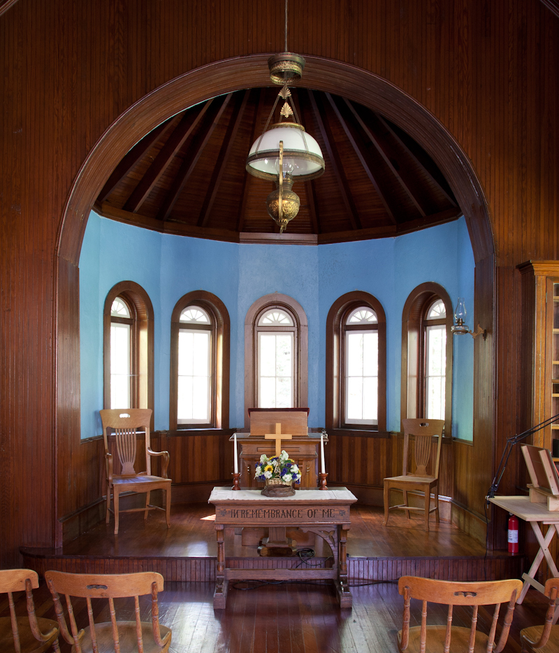 Wood paneling and an apse adorn the interior of the chapel. Pennsylvania State Historic Preservation Office / Photo, David Coulter