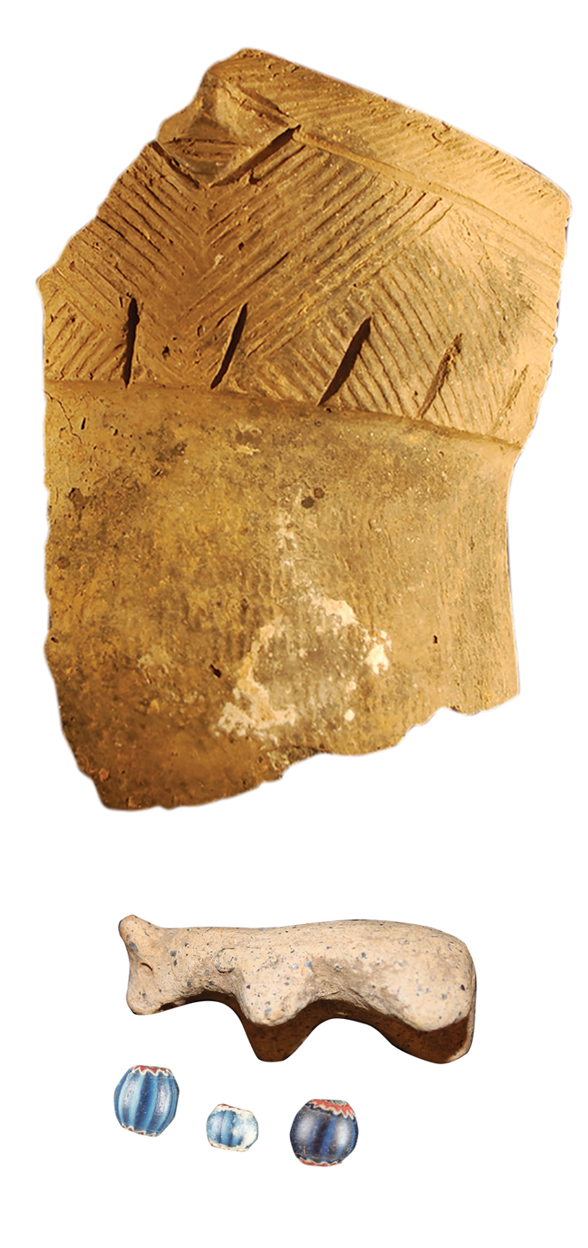 A sherd of incised pottery, glass beads and a bear effigy are among the artifacts uncovered at the site of the Susquehannock Village at Lemoyne. The State Museum of Pennsylvania