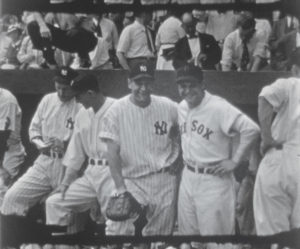 Sluggers Lou Gehrig (New York Yankees) and Jimmie Foxx (Boston Red Socks) pose for photos in front of the American League dugout, while surrounded by teammates, before the 1937 Major League Baseball All-Star Game. Both Gehrig and Foxx were elected into the National Baseball Hall of Fame, after their playing days were over. Pennsylvania State Archives, MG-254