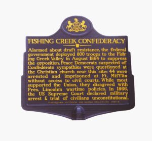 The state marker places the military trials at Harrisburg within a national context by referring to the Supreme Court's 1866 decision in Ex parte Milligan. Courtesy Jonathan W. White