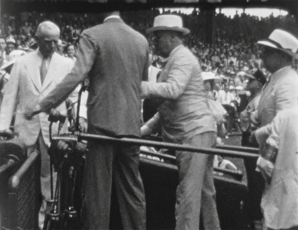 President Franklin D. Roosevelt walking into the stands of Washington's Griffith Stadium before the 1937 Major League Baseball All-Star Game. This remarkable image was taken from a home movie filmed by Senator's pitcher Jimmie DeShong. Pennsylvania State Archives, MG-254