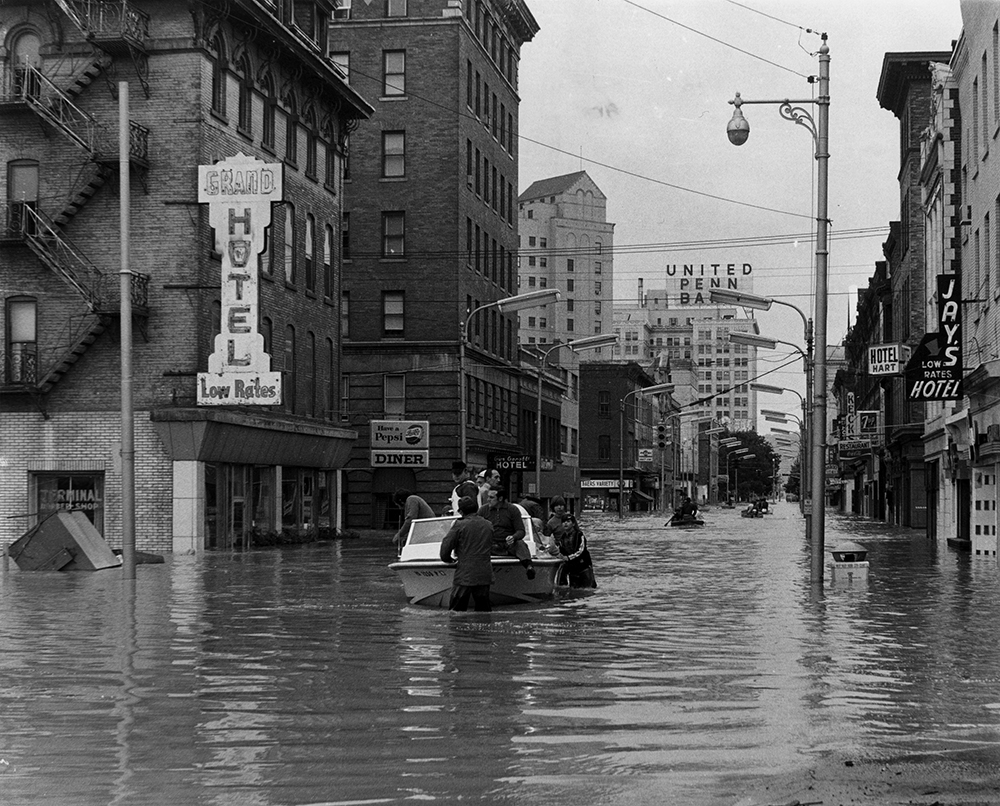 Flood victims are rescued from high water on a main thoroughfare in Wilkes-Barre. Pennsylvania State Archives, MG-218