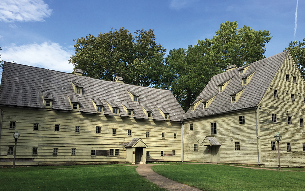 Saron, the building to the left, was constructed in 1743 and served as the dormitory for the celibate Sisters at Ephrata. Saal, on the right, was the Sisters’ meetinghouse, built in 1741. Ephrata Cloister, PHMC