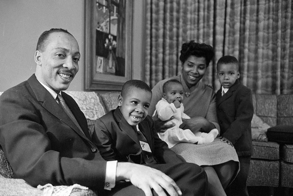 The Myers family — from left, Bill, William III, Lynda, Daisy and Stephen — pose in the living room of their new home for a feature story in Look magazine. Their move to the all-white community of Levittown overlapped with events at Little Rock, Arkansas, where nine Black students enrolled in an all-white public high school. Look Magazine Photograph Collection, Library of Congress Prints and Photographs Division