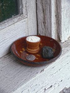 The placing of the Three Things (Die Drei Dinger) on the windowsill overnight on New Year’s Eve is an old custom meant to bring abundance to the household. Each object represents aspects of household necessities, which it is believed will not run out in the new year. Photo by Patrick J. Donmoyer