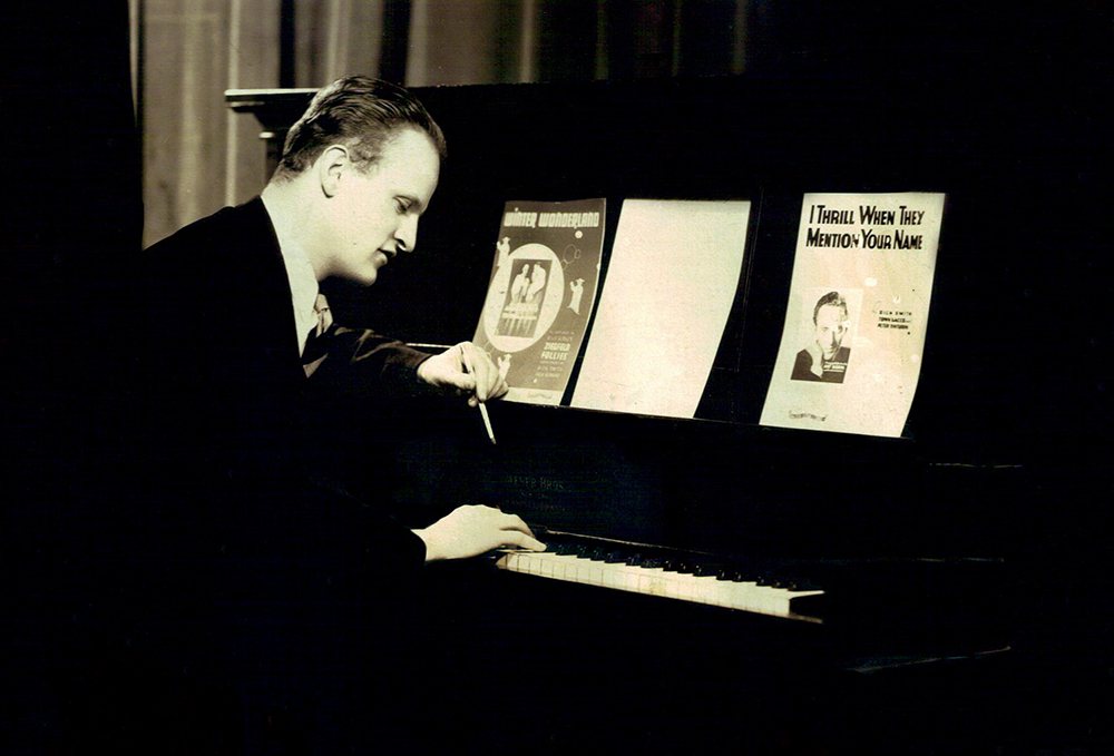 Dick Smith at the piano, with sheet music for “Winter Wonderland” on the music rack. Wayne County Historical Society, Honesdale PA